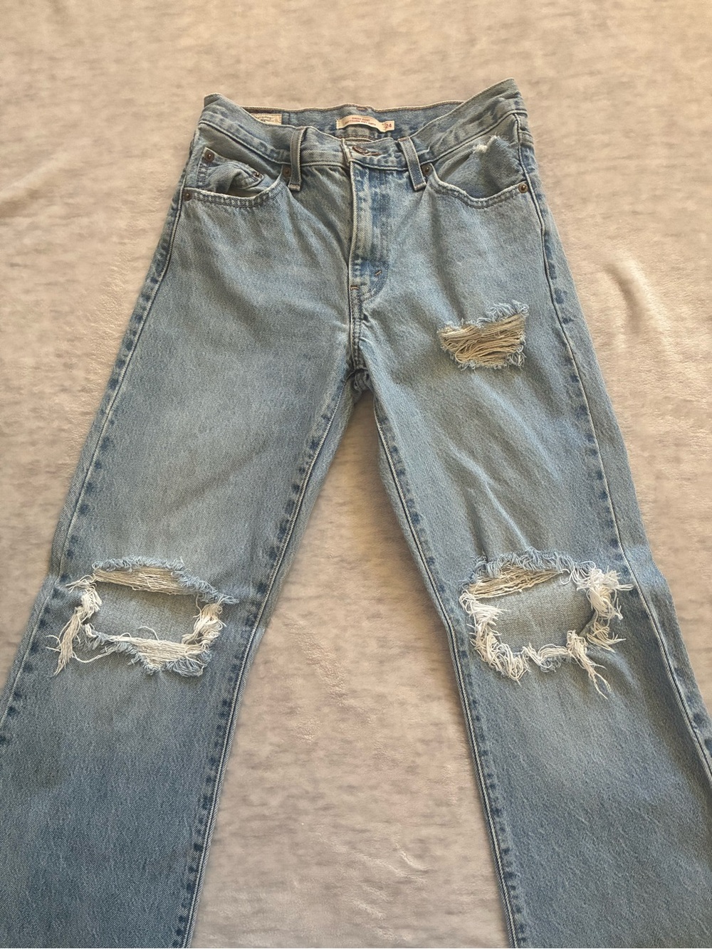 Levi’s ripped flare jeans
